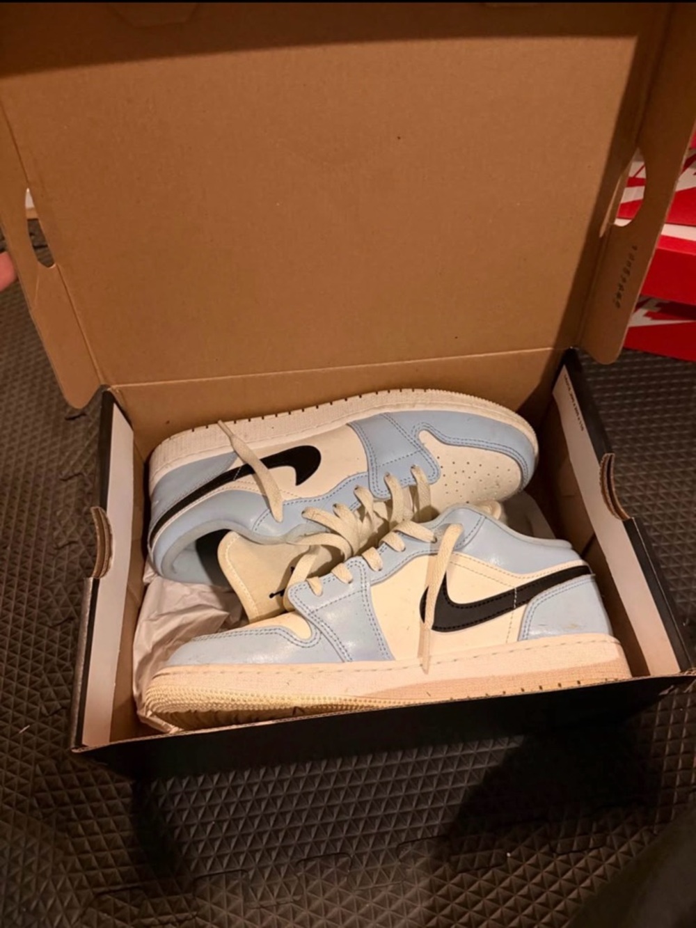 Jordan 1 lows Blue and Cream Low-Top Sneakers with Black Swoosh